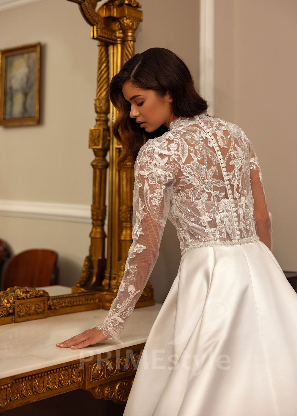 Elegantné čipkované svadobné šaty...